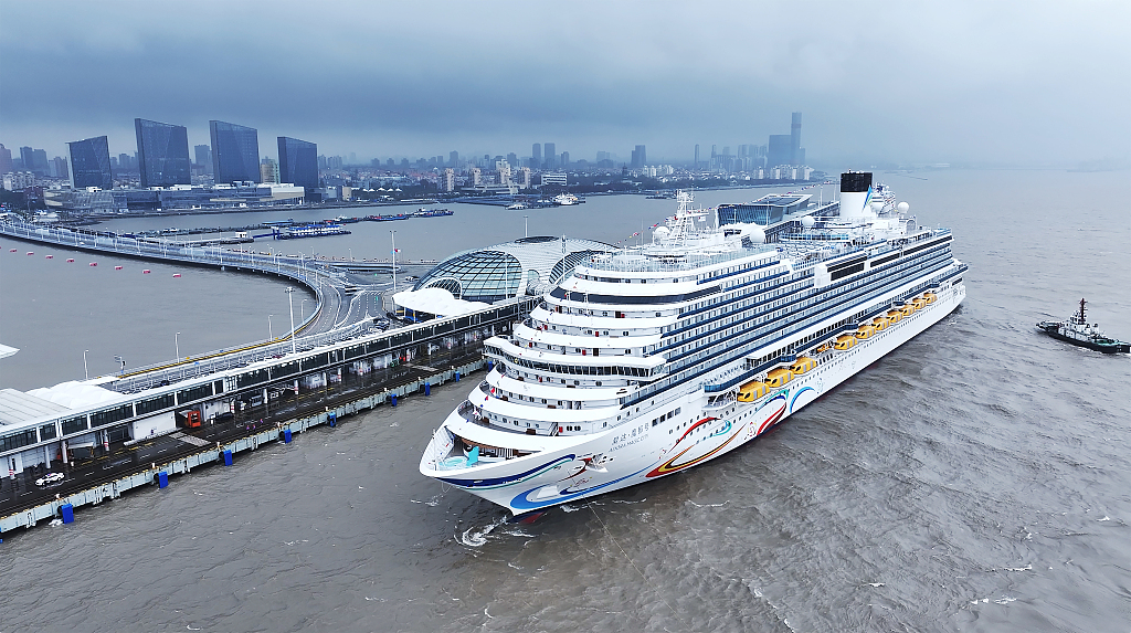 The Adora Magic City, China's first domestically built large cruise ship, berths at the Shanghai Wusongkou International Cruise Terminal on December 15, 2023. /CFP