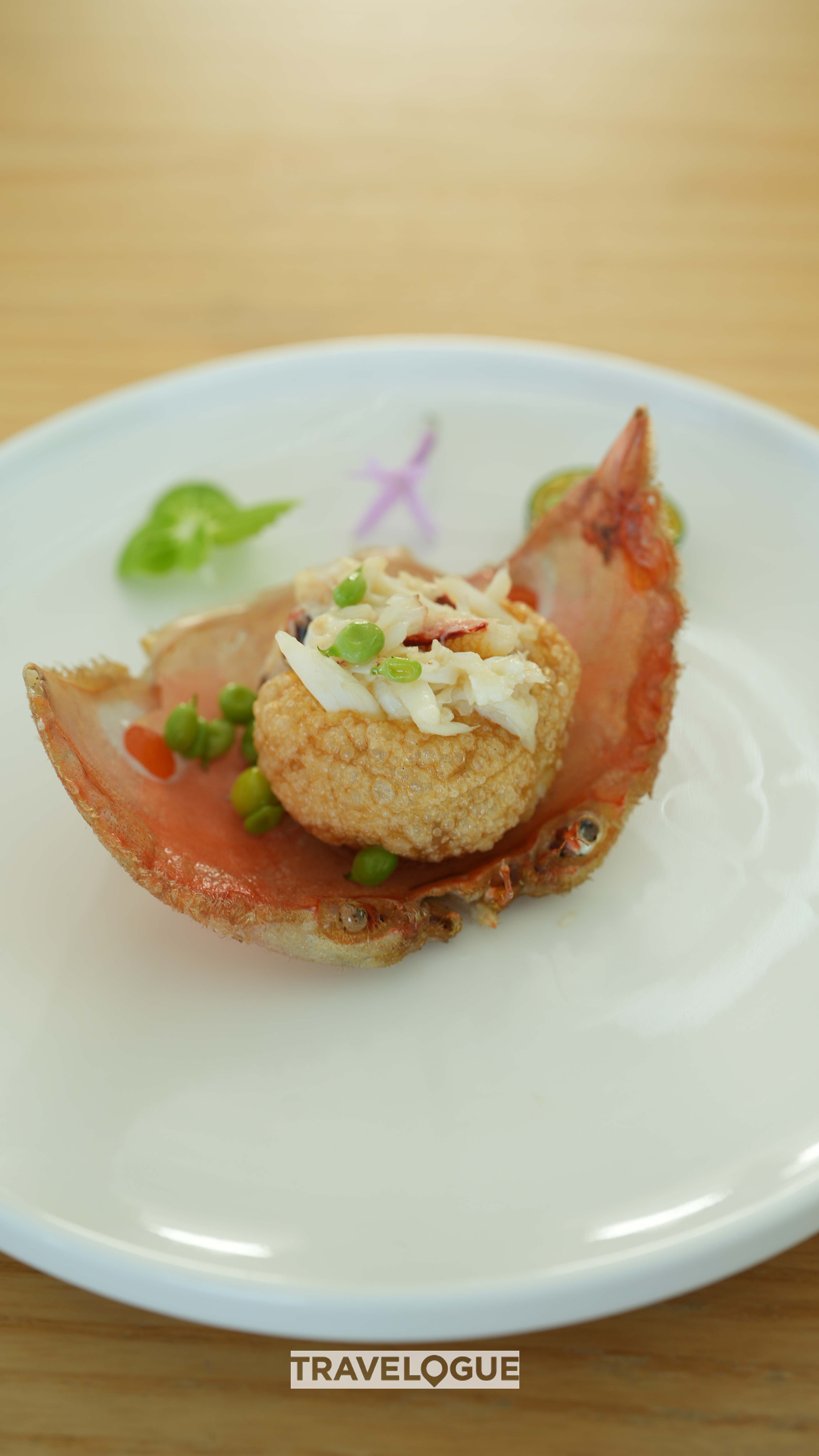 A crispy, crunchy crab meatball served on a deep-fried crab shell. /CGTN