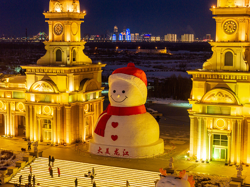 A night view of the giant snowman, a landmark of Harbin City, Heilongjiang Province, December 15, 2023. /CFP