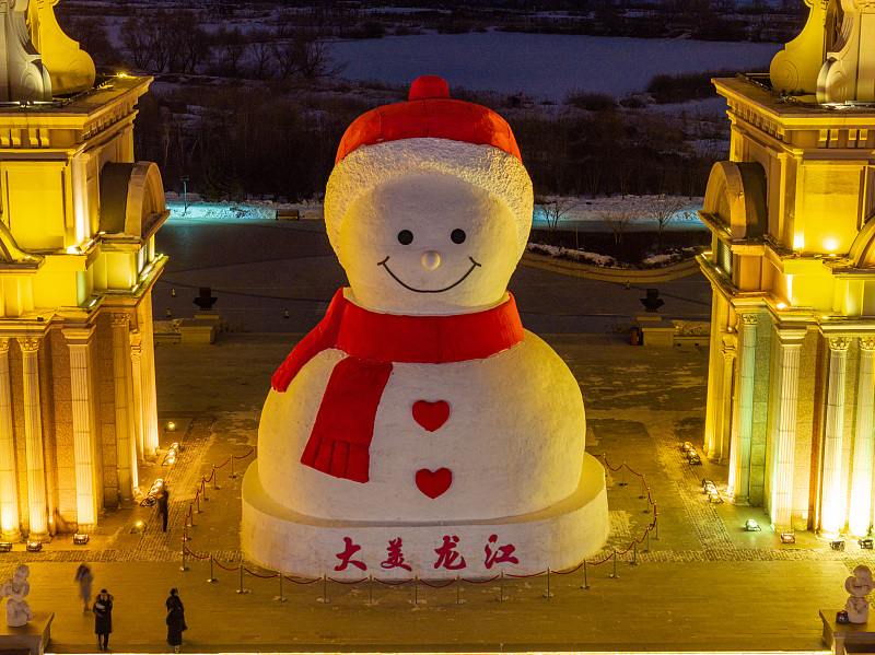 A night view of the giant snowman, a landmark of Harbin City, Heilongjiang Province, December 15, 2023. /CFP