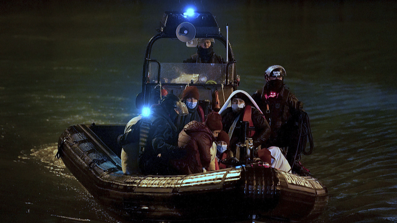 A group of people thought to be migrants are brought in to Dover, Kent, onboard a Border Force vessel, following a small boat incident in the Channel, December 24, 2021. /CFP