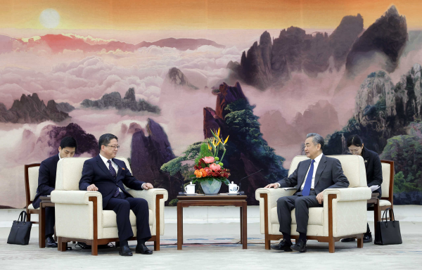 Chinese Foreign Minister Wang Yi (R) holds talks with Deputy Foreign Minister of the Democratic People's Republic of Korea Pak Myong Ho in Beijing, China, December 18, 2023. /Chinese Foreign Ministry