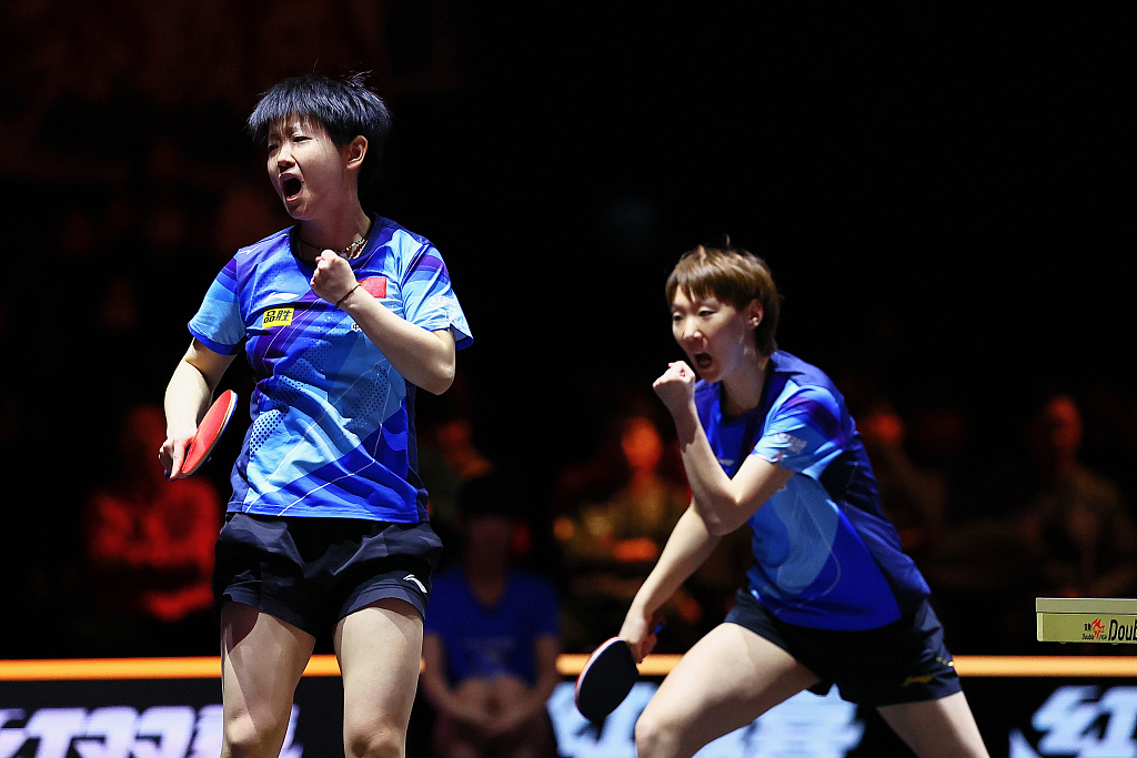 Sun Yingsha (L) and Wang Manyu in action during the doubles final at the 2023 Women's WTT Finals in Nagoya, Japan, December 17, 2023. /CFP