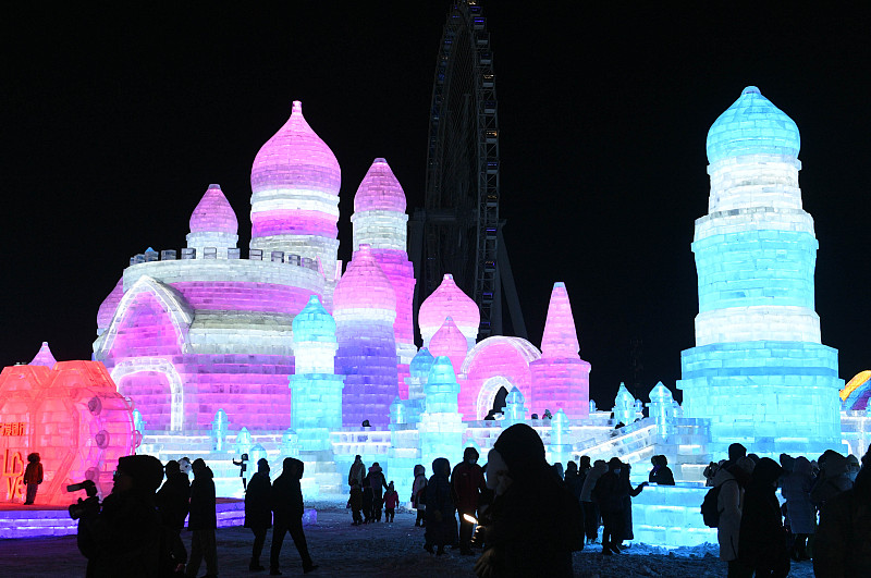 A series of ice and snow sculptures and artistic installations are illuminated at Harbin Ice and Snow World during trial operations in Harbin City, Heilongjiang Province, on December 17, 2023. /CFP