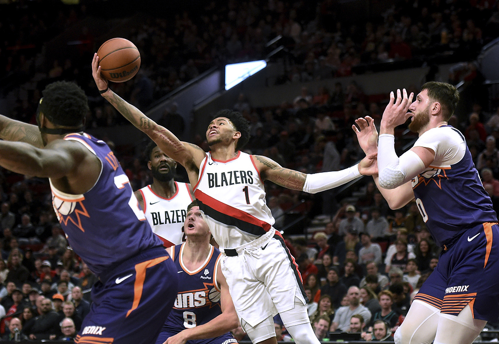 Anfernee Simons (#1) of the Portland Trail Blazers grabs a rebound in the game against the Phoenix Suns at Moda Center in Portland, Oregon, December 19, 2023. /CFP