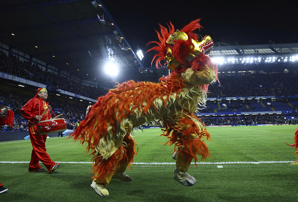 A photo taken on February 3, 2023, shows a dragon dance performed at the half-time break of a Premier League match at Stamford Bridge, London. /CFP