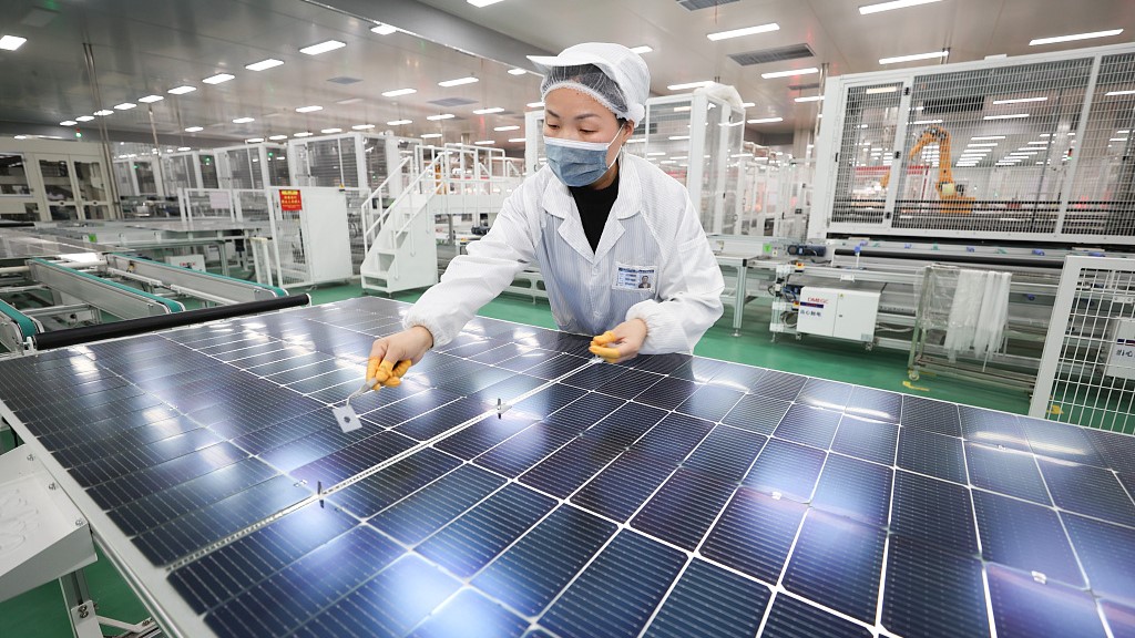 A technician works on a solar panel production line in east China's Jiangsu Province, December 15, 2023. /CFP