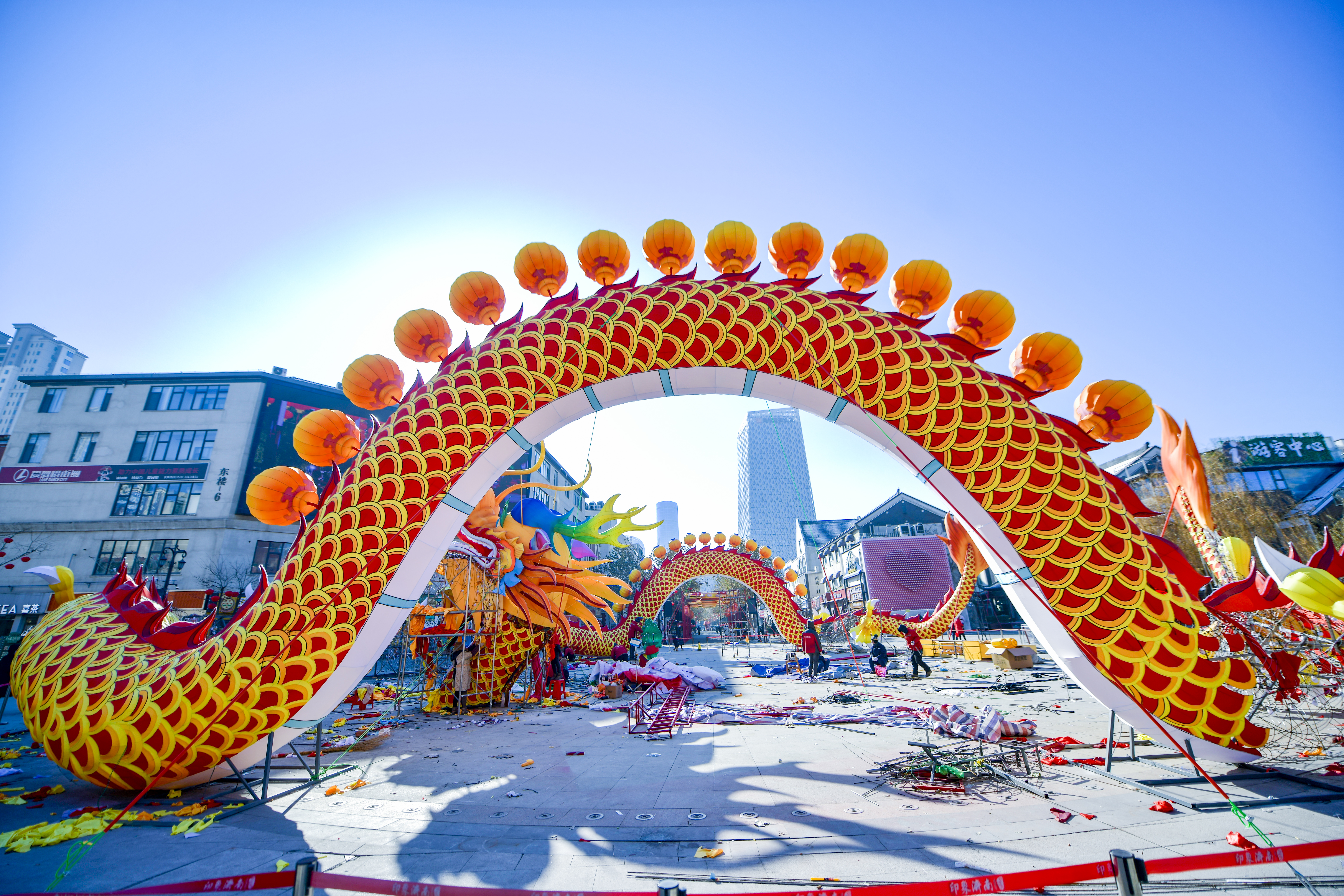 A 30-metre-long festive dragon lantern is seen being assembled at 
