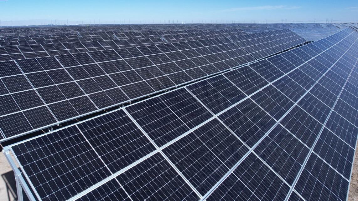 Solar panels of the 900-megawatt photovoltaic project in northwest China's Qinghai Province. 