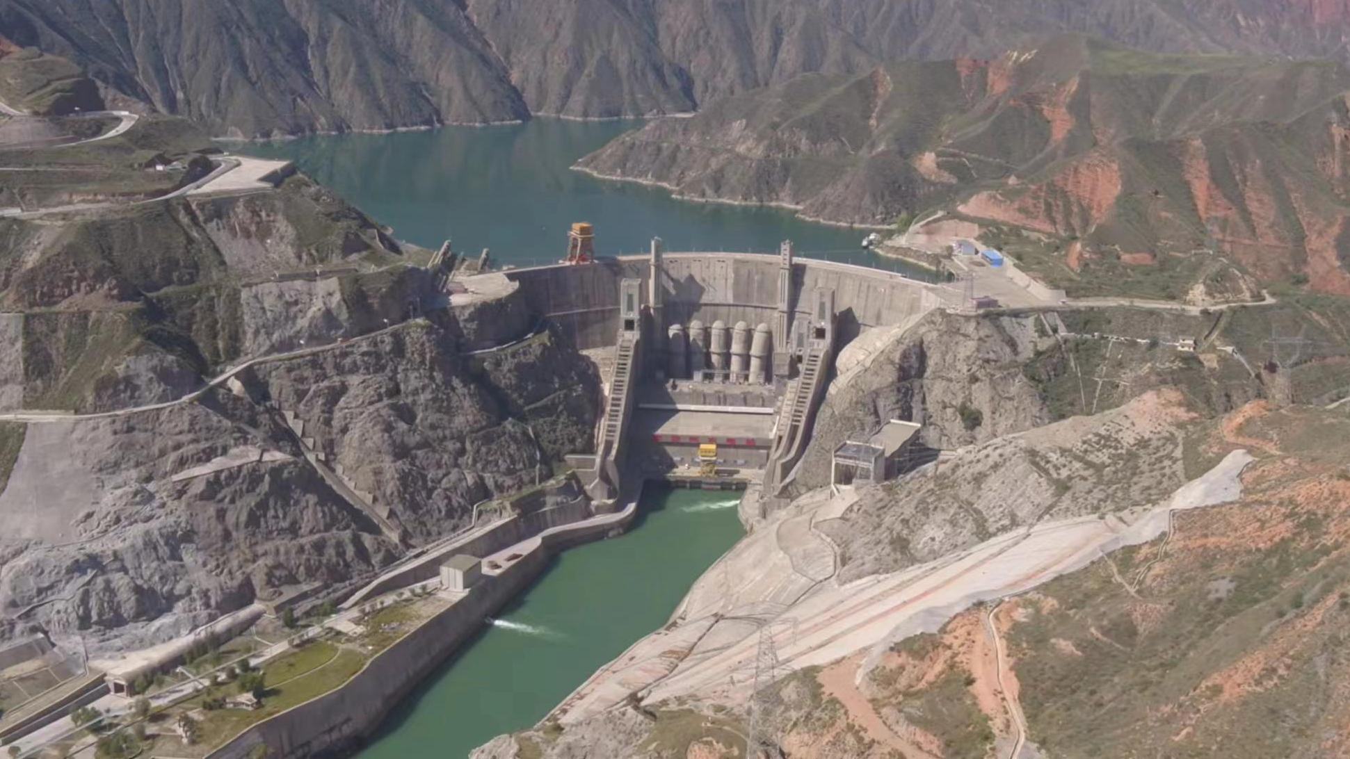 An aerial view of the Lijiaxia Hydropower Station at the border of Jainca County and Hualong County in northwest China's Qinghai Province. 