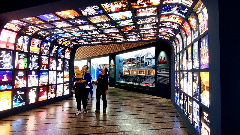 Visitors enjoy an exhibition as part of the 16th founding anniversary celebrations at the National Centre for the Performing Arts in Beijing, December 22, 2023. /CFP