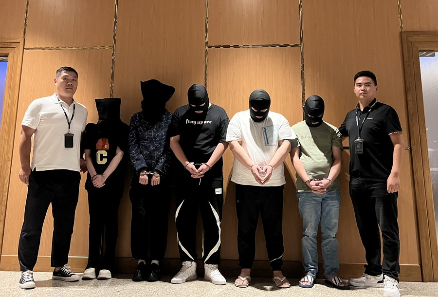 Myanmar police hand over five telecom and internet fraud suspects to Chinese police at Yangon International Airport in Yangon, Myanmar, August 26, 2023. /Chinese embassy in Myanmar, handout via Xinhua