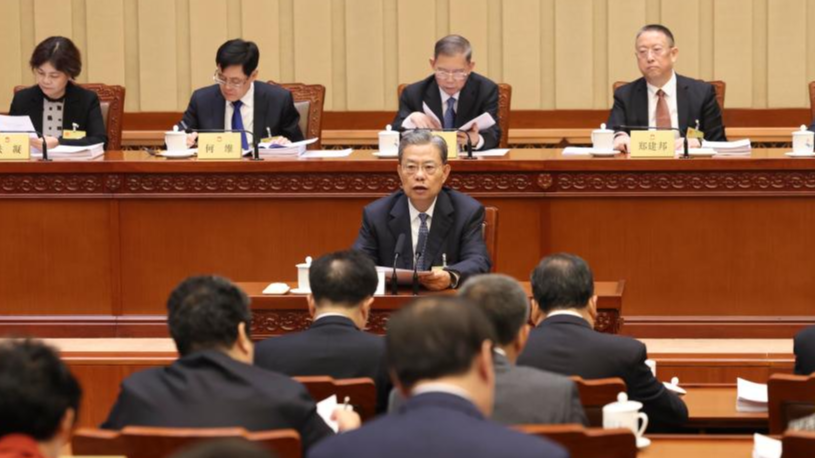 Zhao Leji, chairman of the National People's Congress Standing Committee, attends the second plenary meeting of the seventh session of the 14th NPC Standing Committee at the Great Hall of the People in Beijing, capital of China, December 26, 2023. /Xinhua
