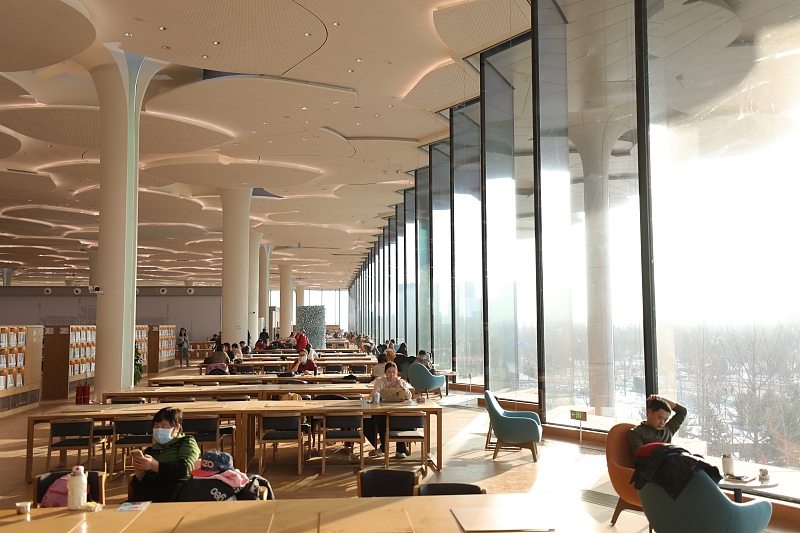 Visitors enjoy their reading time at the new Beijing City Library on December 27, 2023. /CFP