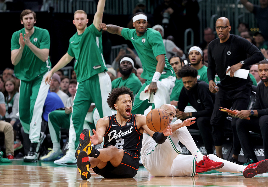 Cade Cunningham (#2) of the Detroit Pistons screams out after colliding with Derrick White of the Boston Celtics during their NBA game in Boston, U.S., December 28, 2023. /CFP