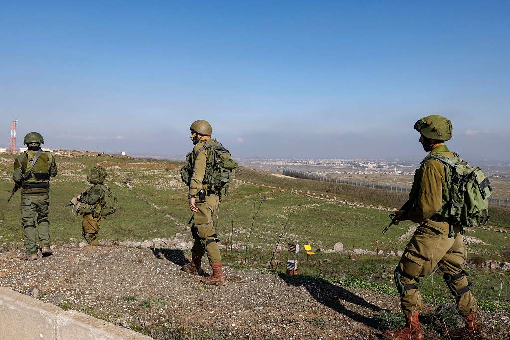 Israeli soldiers man a position in the Israel-annexed Golan Heights near the border with Syria, December 28, 2023. /CFP