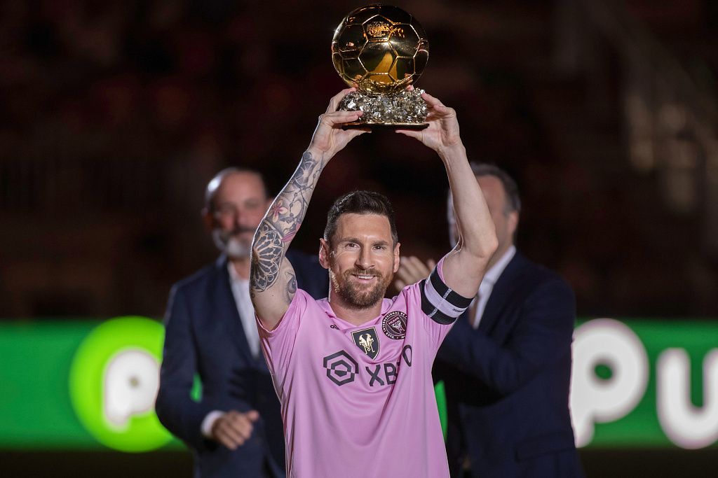 Inter Miami's Lionel Messi shows the fans his 8th Ballon d'Or award at the DRV PNK Stadium in Fort Lauderdale, Florida, U.S., November 10, 2023. /CFP
