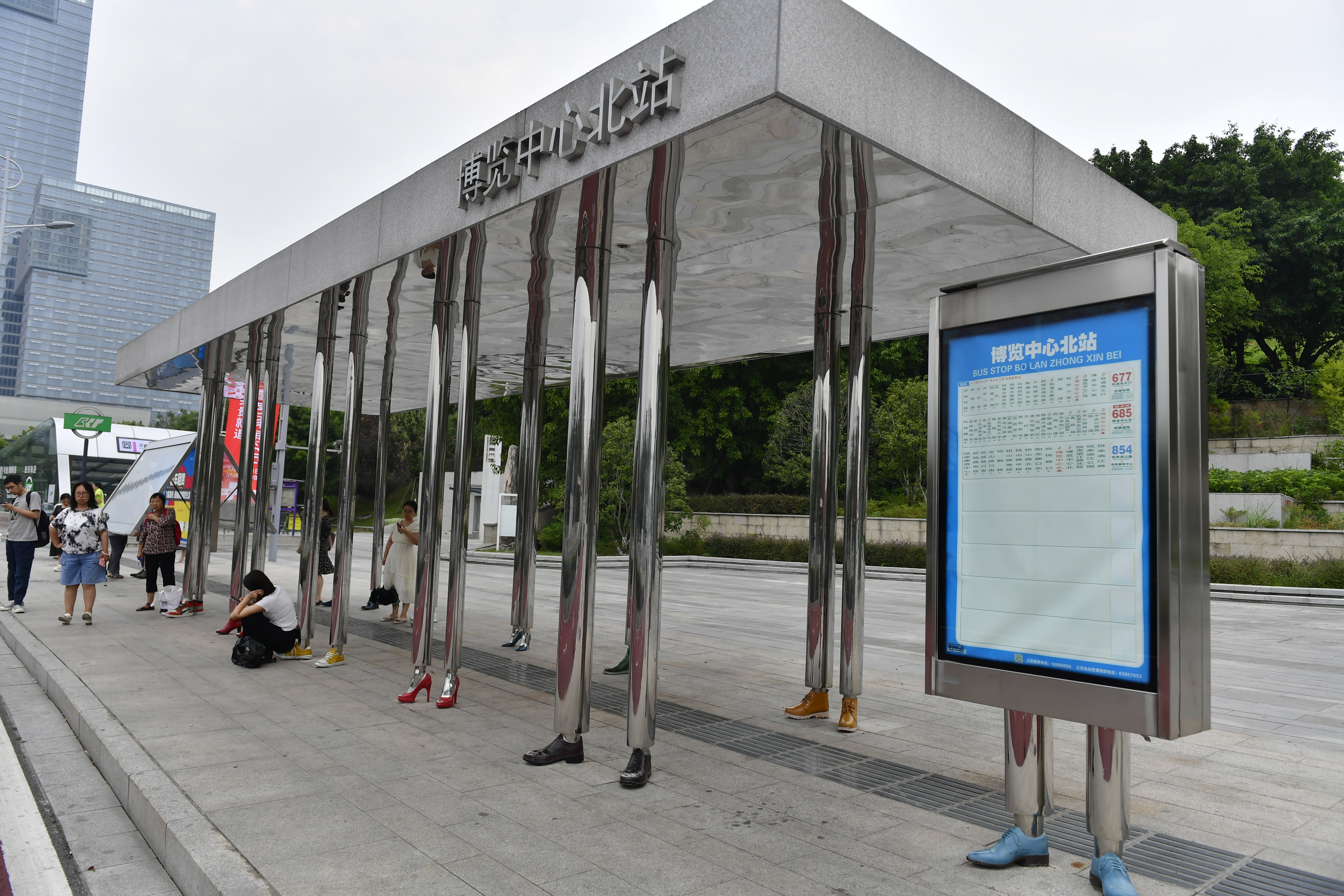 A bus shelter supported by chrome columns wearing shoes is seen in the Yubei district of southwest China's Chongqing Municipality on September 19, 2023. /IC