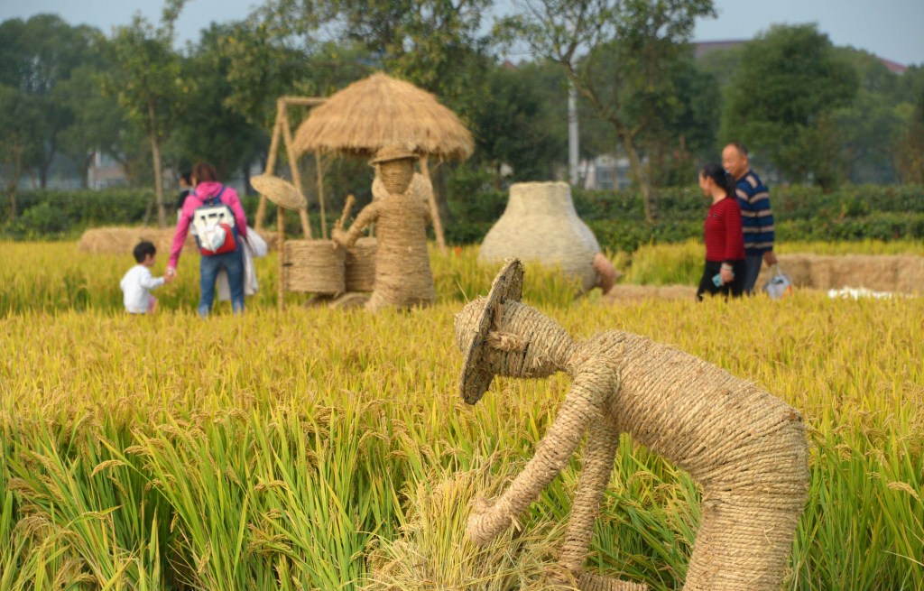Artistic sculptures are seen in a paddy field in Changda Village, Shanghai, on October 27, 2023, during a three-day music festival. /CFP