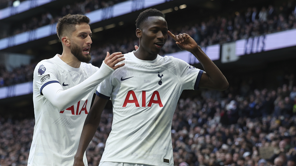 Tottenham's Pape Matar Sarr (R) celebrates after scoring his side's opening goal in their Premier League clash against Bournemouth in London, UK, December 31, 2023. /CFP