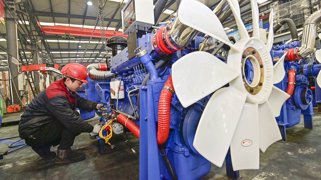 A worker operates at a generator manufacturing plant in east China's Shandong Province, December 31, 2023. /CFP