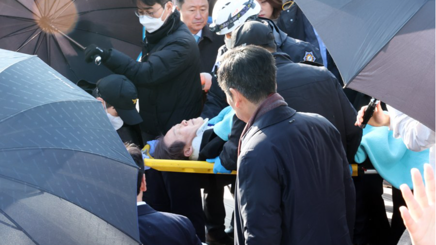 Lee Jae-myung, chief of South Korea's main opposition Democratic Party, is rushed to a hospital after being attacked during his visit to Busan, South Korea, January 2, 2024. /Xinhua
