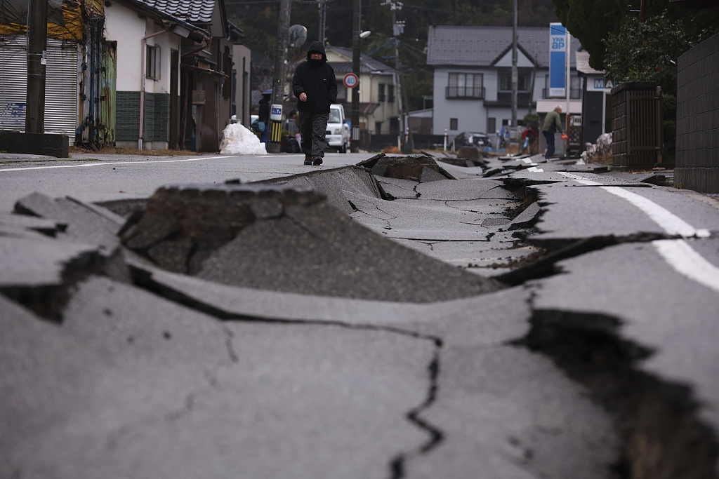 A road is cracked in Wajima City, Ishikawa Prefecture, Japan, January 3, 2024. /CFP