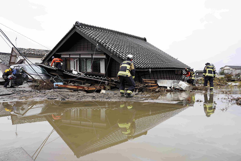 Firefighters conduct a search at a disaster-hit area in Suzu City, Ishikawa Prefecture, Japan, January 3rd, 2024. /CFP