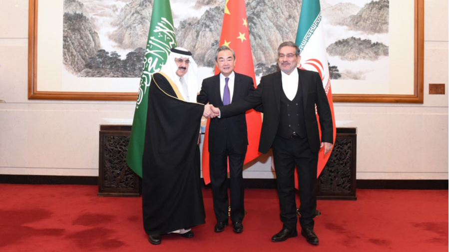 Wang Yi (C), a member of the Political Bureau of the Communist Party of China Central Committee and director of the Office of the Foreign Affairs Commission of the CPC Central Committee, attends a closing meeting of the talks between the Saudi delegation led by Musaad bin Mohammed Al-Aiban (L), Saudi Arabia's minister of state, member of the Council of Ministers and national security advisor, and Iranian delegation led by Admiral Ali Shamkhani (R), secretary of the Supreme National Security Council of Iran, in Beijing, capital of China, March 10, 2023. /Xinhua