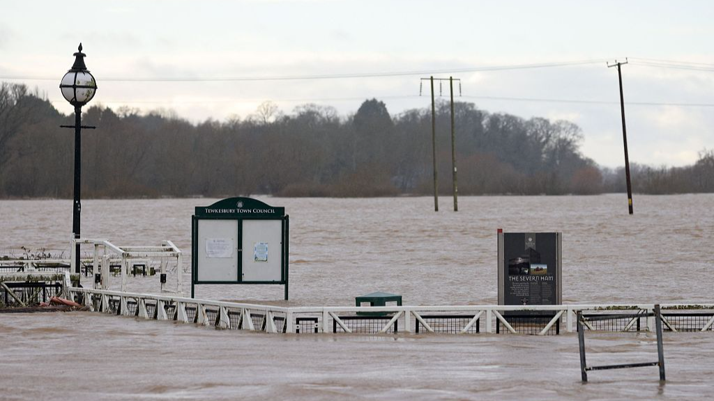 Floodwater surrounds the Severn Ham sign after the Rivers Severn and Avon burst their banks in Tewkesbury, western England, following Storm Henk, which brought strong winds and heavy rain across much of the country, January 3, 2024. /CFP