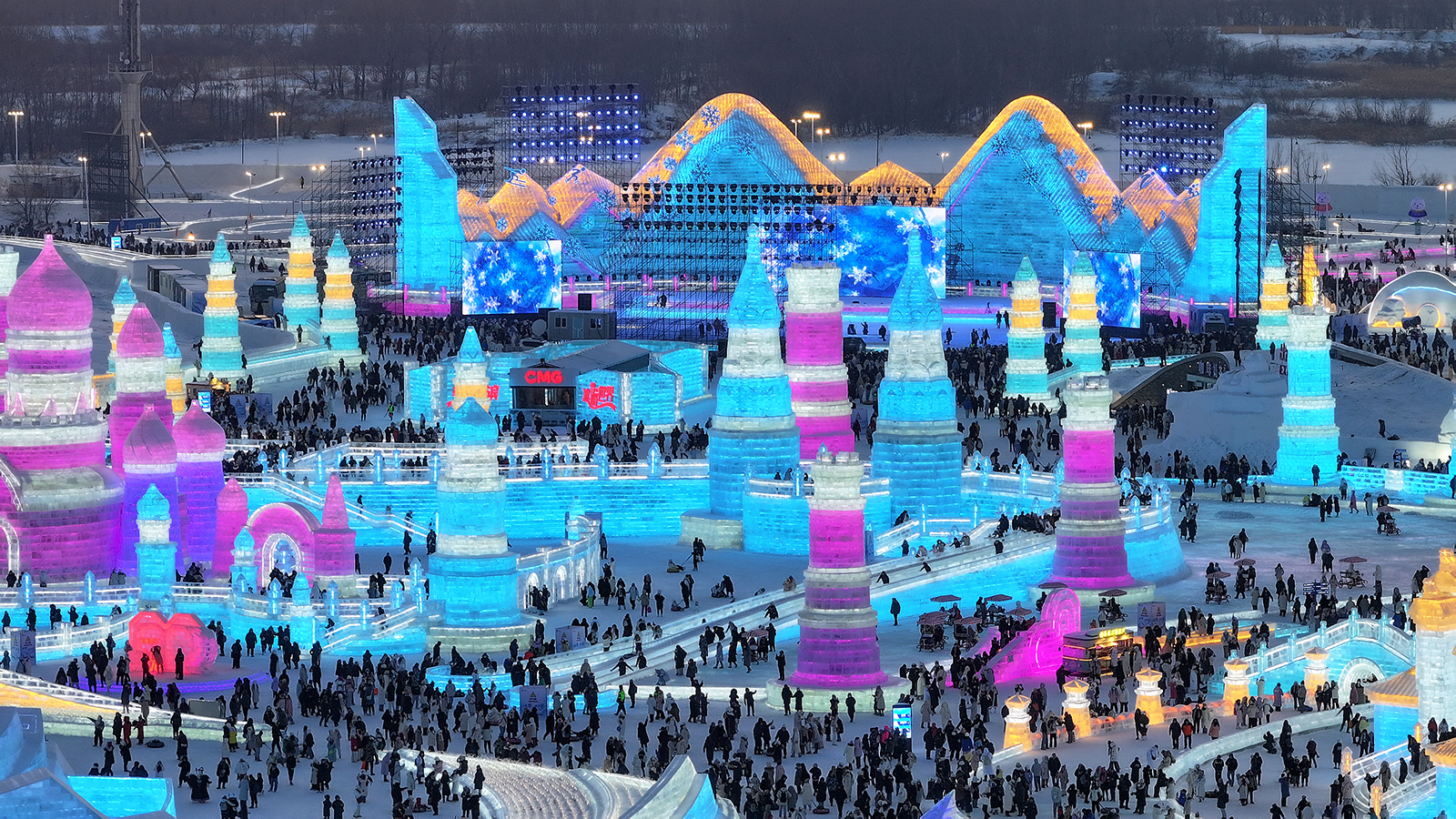 Tourists visit Harbin Ice and Snow World in Harbin, northeast China's Heilongjiang Province on December 31, 2023. /IC