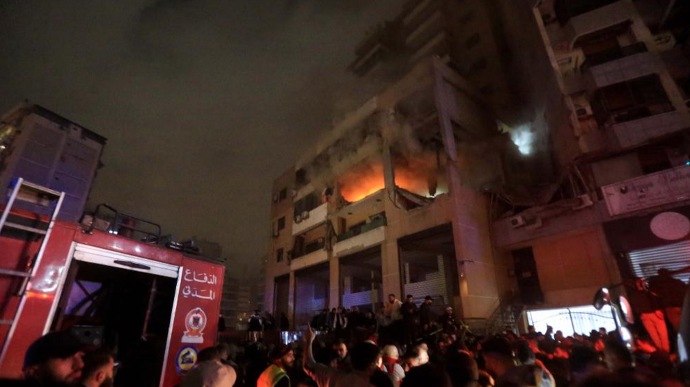 People gather outside an apartment belonging to the Hamas movement destroyed by an Israeli attack on the southern suburb of Beirut, Lebanon, January 2, 2024. /Xinhua