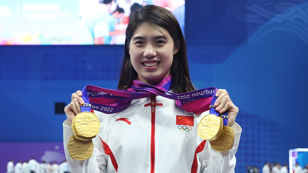 China's Zhang Yufei displays her gold medals at the 19th Asian Games in Hangzhou, Zhejiang Province, China, September 29, 2023. /CFP
