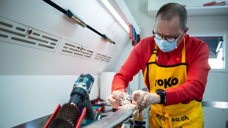 A waxer works in China's first ski wax truck with independent intellectual property in Beijing, China, October 27, 2021. /Xinhua