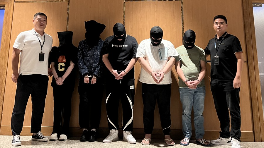 Myanmar police hand over five telecom and internet fraud suspects to Chinese police at Yangon International Airport in Yangon, Myanmar, August 26, 2023. /Xinhua