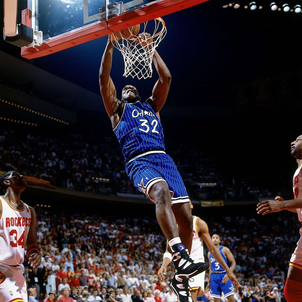 Shaquille O'Neal (#32) of the Orlando Magic dunks in Game 4 of the NBA Finals against the Houston Rockets at the Summit in Houston, Texas, June 14, 1995. /CFP