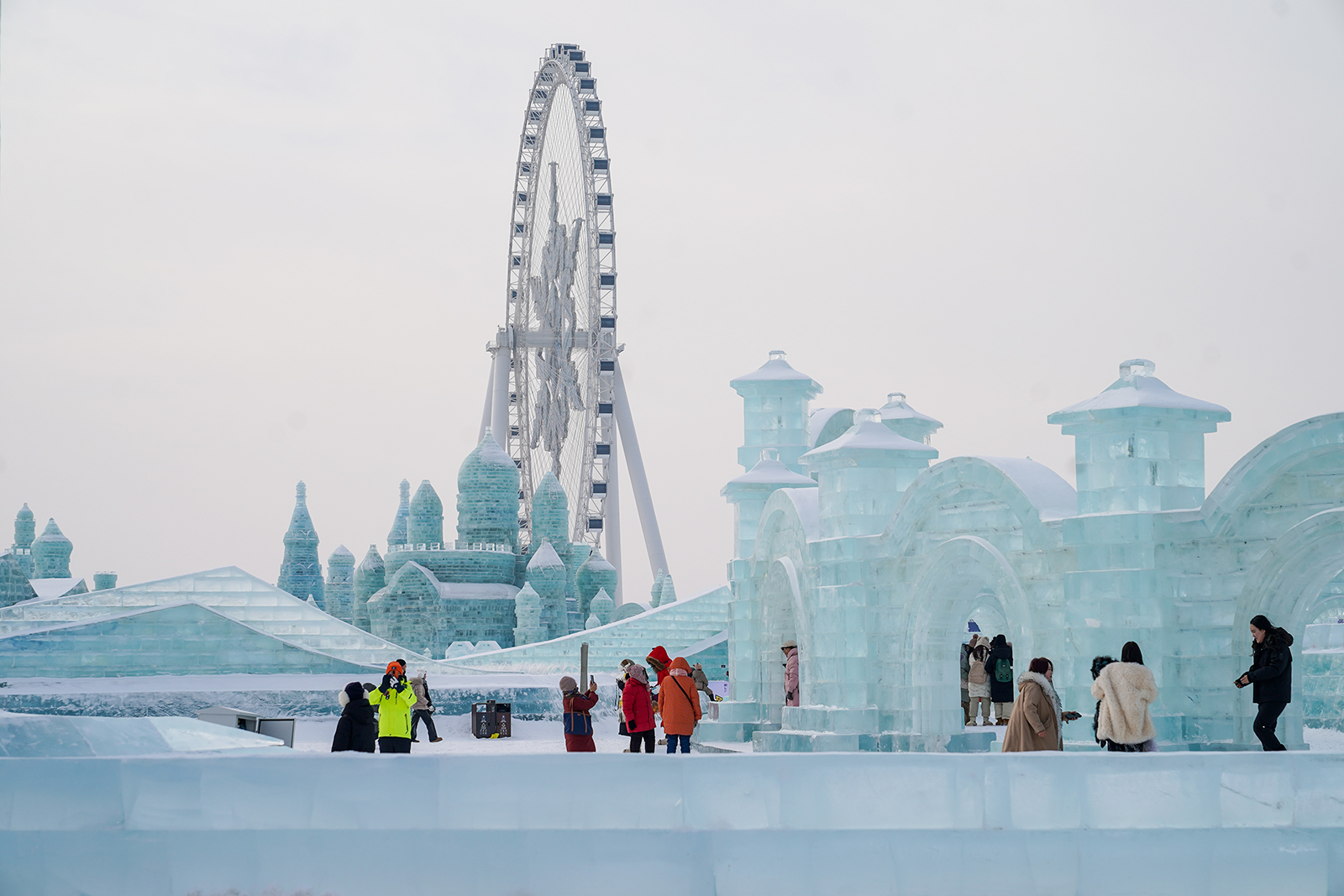 Visitors appreciate ice sculptures at Harbin Ice and Snow World in Harbin, Heilongjiang Province on January 4, 2024. /IC