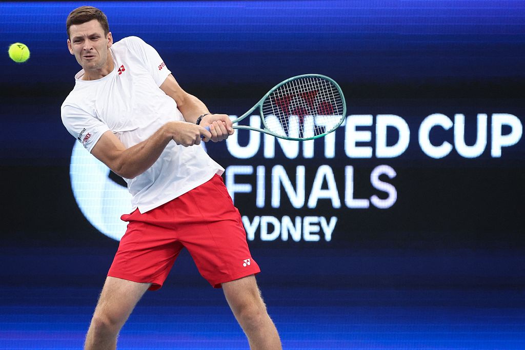 Poland's Hubert Hurkacz hits a return against France's Adrian Mannarino (not pictured) during their men's singles match at the United Cup in Sydney, Australia, January 6, 2024. /CFP