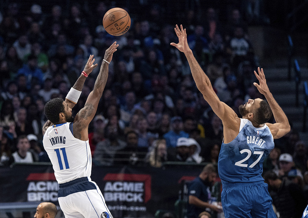 Kyrie Irving (#11) of the Dallas Mavericks shoots in the game against the Minnesota Timberwolves at American Airlines Center in Dallas, Texas, January 7, 2024. /CFP