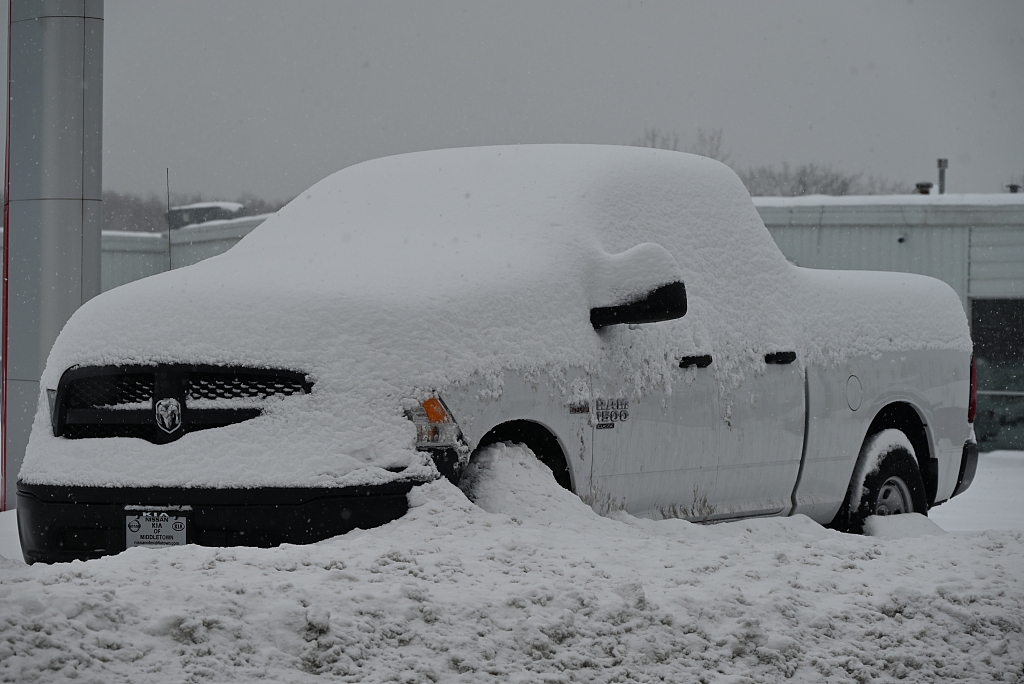 A pickup truck covered in snow in Upstate New York, USA, on January 7, 2024. /CFP