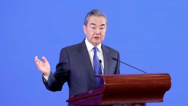Chinese Foreign Minister Wang Yi delivers a speech at the opening ceremony of the symposium on the international situation and China's diplomacy in 2023, in Beijing, China, January 9, 2024. /Chinese Foreign Ministry