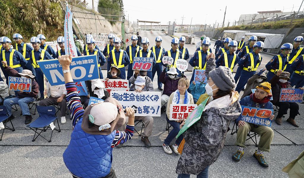 People protest in front of the U.S. Marines' Camp Schwab in Nago, Okinawa Prefecture, on January 10, 2024. /CFP