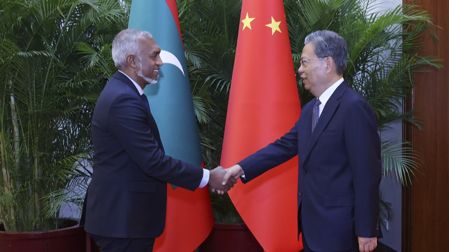 Zhao Leji (R), chairman of the NPC Standing Committee, meets with Mohamed Muizzu, president of the Maldives, in Beijing, China, January 11, 2024. /Xinhua