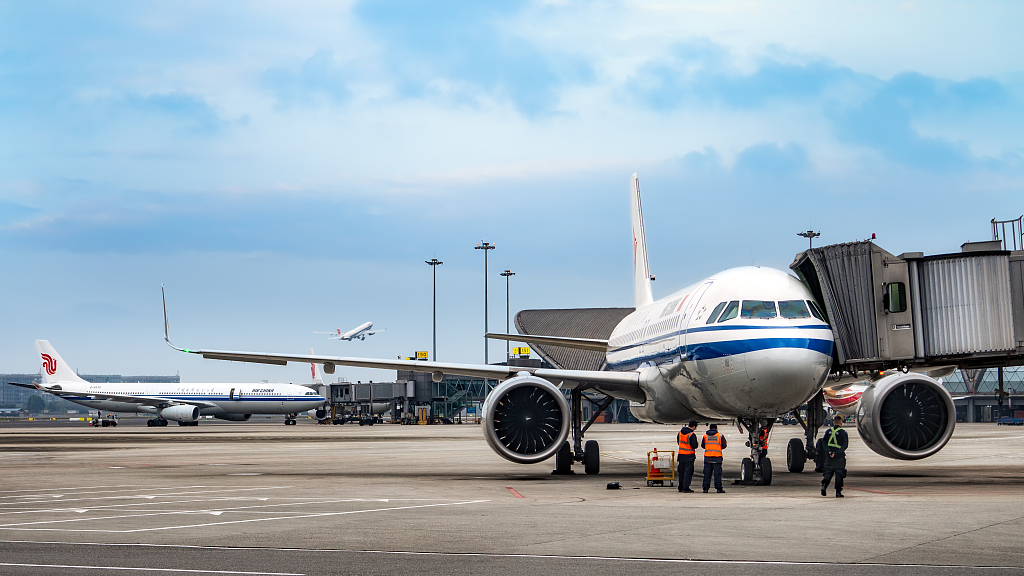 An Air China passenger plane docks at Terminal 2 of Chengdu Shuangliu International Airport, Chengdu City, southwest China's Sichuan Province, March 22, 2023. /CFP