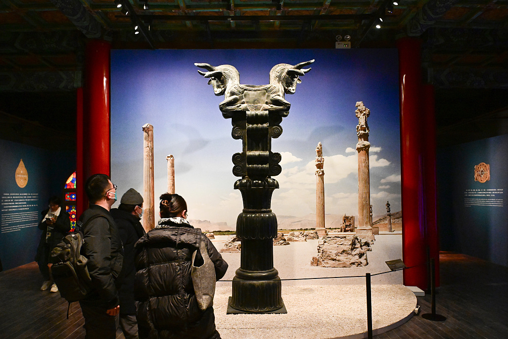 People view a cultural relic replica from Iran at the Palace Museum in Beijing, January 10, 2024. 