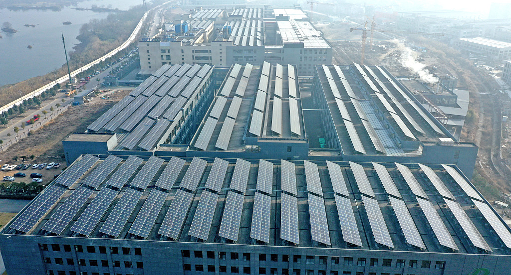 Solar panels are installed on the roof of a company's buildings in Taizhou City, east China's Zhejiang Province, January 11, 2024. /CFP