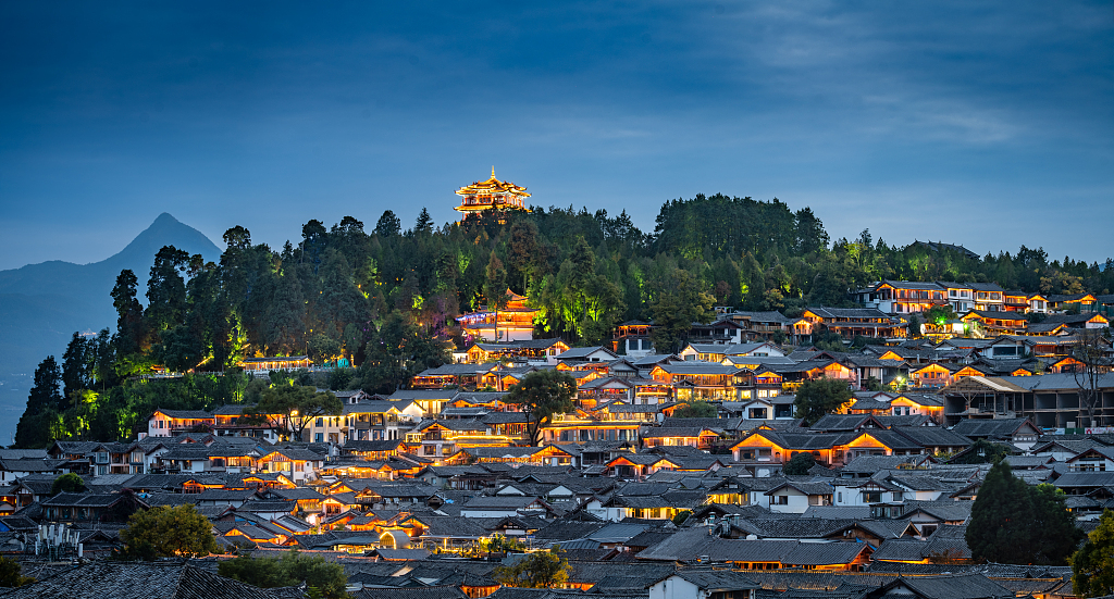 A photo taken on November 16, 2023, shows the Old Town of Lijiang in Yunnan Province, southwest China, lit up after sunset. /CFP
