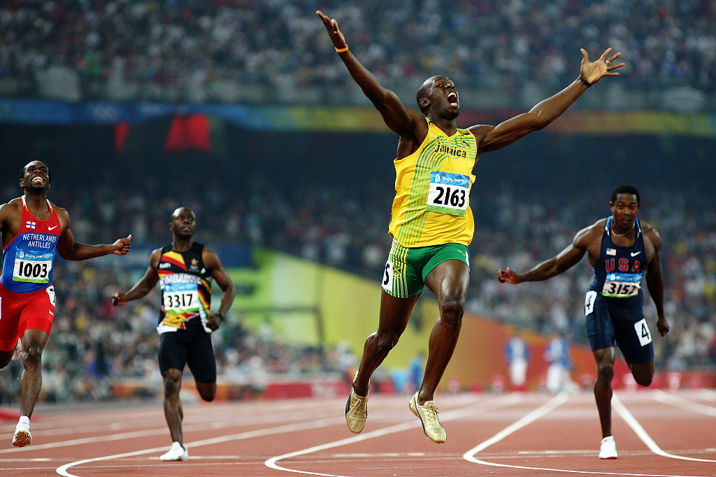 Usain Bolt (#2163) of Jamaica competes on his way to breaking the world record with a time of 19.30 to win the gold medal in the men's 200m final during the Beijing 2008 Olympic Games in Beijing, China, August 20, 2008. /CFP