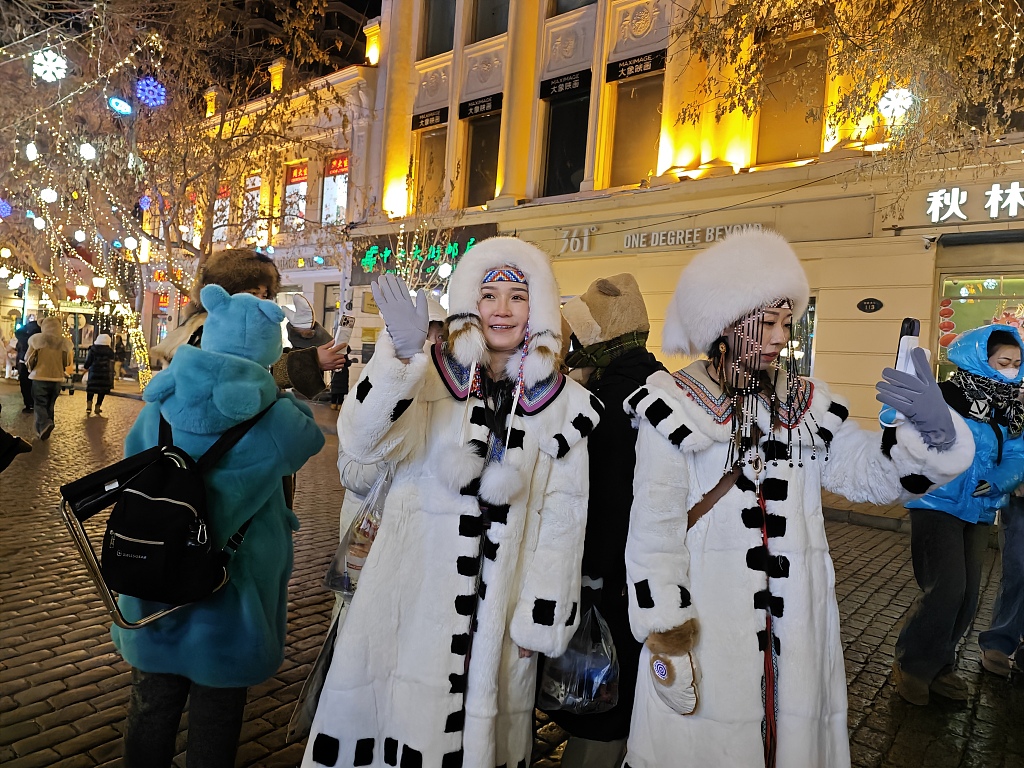 The Ewenki people showcase their culture along Zhongyang Street in Harbin City, January 7, 2024. /CFP