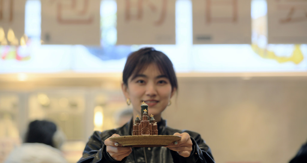 A dessert shop located near Harbin's Saint Sophia Cathedral displays a cake shaped like the iconic city landmark on January 12, 2024, in northeast China's Heilongjiang Province. /CFP